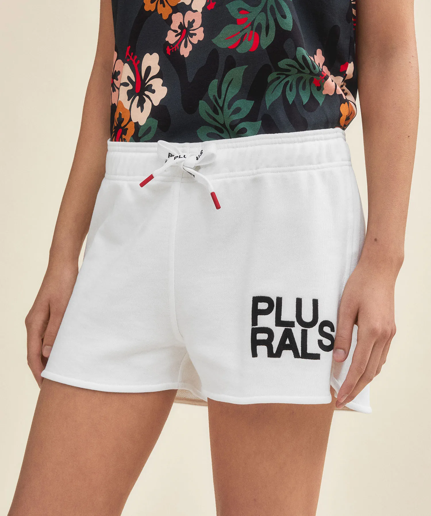 Shorts con scritta Plurals